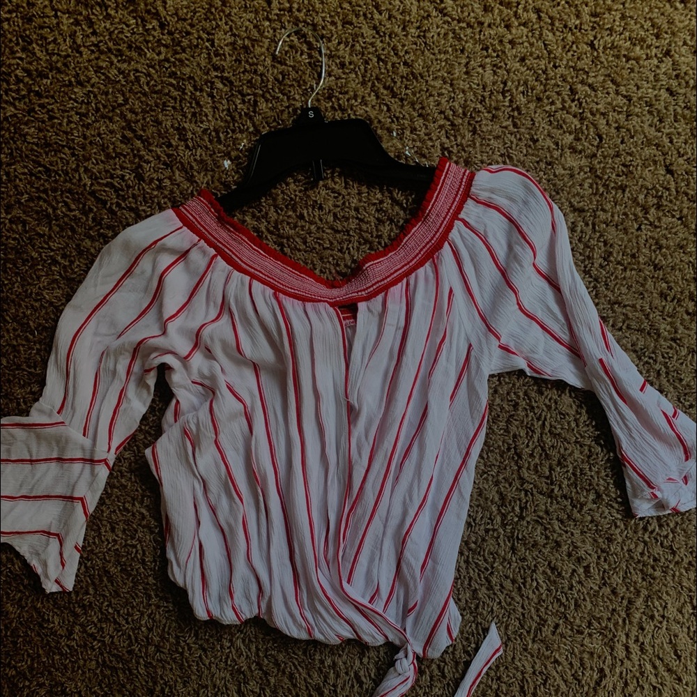 Off the shoulder, flowing blouse.